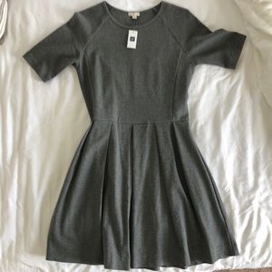 Short sleeve pleated dress.